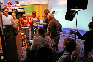 Various cast and crew members (Matt Vogel, Leslie Carrara, Peter Linz, Carmen Osbahr) working on Sesame's Nascar spoof, 2006