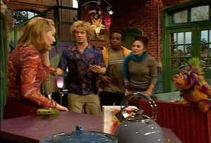 Niki and her band members Mike, Samantha, and Tom with Tingo.