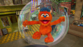 Rudy envisions himself floating over Sesame Street in a bubble in "Rudy Blows His First Bubble"