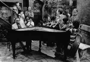 Ray Charles in the yard with Maria, Gordon, Bob, and the kids