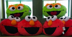 Face cushions. Characters included Elmo, Oscar the Grouch and Cookie Monster (not shown). 2012