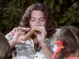 Keola playing the nose flute