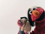 Elmo and Abby with Sia-inspired wigs