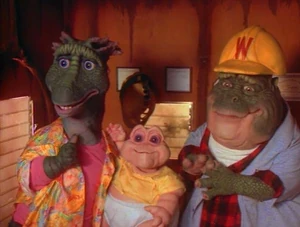 Two embarrassed parents with their proud Baby