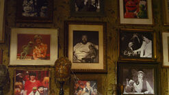 The MuppetsJim Henson and Kermit photo on the wall.