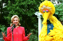 Clinton with Big Bird on the grounds of the White House.