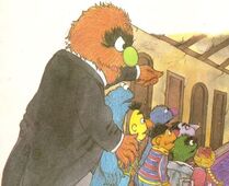 A giant monster butler appears in the 1985 book The House of Seven Colors; since the bridge is broken, the Sesame Street gang have to spend the night in the titular home, with the monster showing them to their rooms.