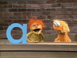 Zoe and Merry discuss A for Arms (First: Episode 3263)