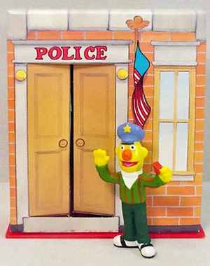 Bert as a policeman ( by , 1987)