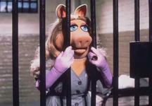 GMC-PiggyBehindBars.jpg (159 KB)