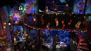 Rowlf performing with the Roots.