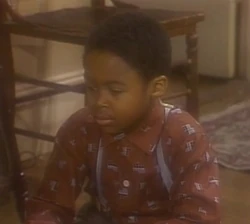 Billy Mack as young Gordon in Episode 1662, fascinated by his train set