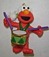 2000 "Elmo Drummer Boy" Elmo with a Santa cap and a drum