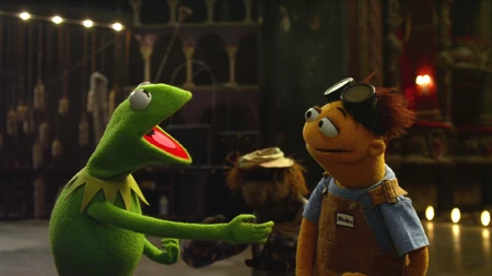 This shot from The Muppets shows Kermit's arm rods and Beauregard's arm sleeve digitally erased.