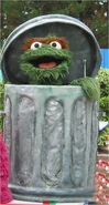 Oscar as he appeared at Sesame Place prior to 2012. Oscar's trash can was perched on top of building blocks.