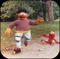 A1 Baby Elmo takes a tumble.