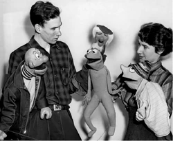 Jim and Jane with the cast, including Pierre the French Rat