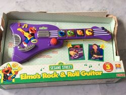 Elmo s Rock Roll Guitar Muppet Wiki Fandom