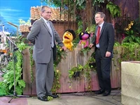 USAID/Indonesia Mission Director Bill Frej (left) with US Charge d’Affaires John Heffern (right) talk with Momon and Putri. The cast of Jalan Sesama were introduced in Jakarta on Tuesday (5/22/2007)