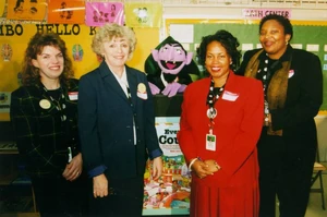 "Census in the Schools" staff thank Count von Count for attending.