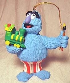 GrolierHerryTrain.jpg (44 KB) Herry Monster holding a train.