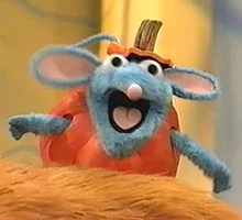 Tutter dressed as a pumpkin in Bear in the Big Blue House "Halloween Bear"