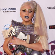 Lady Gaga with her awards at the 2011 MTV EMAs