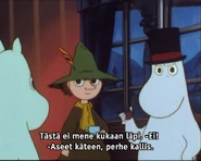 Muumipappa käskee perhettään ottamaan aseet esiin Mörön saapumista varten