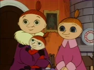 Mymmeli kahden tyttärensä kanssa