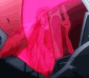 The unknown device being destroyed; a blurry figure can be seen inside