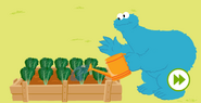 Cookie Monster is planting Green Spinach