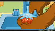 Baby Bear washing the strawberries
