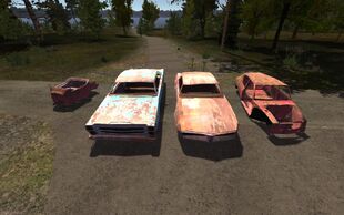 Todos os carros destruídos posicionados lado a lado.