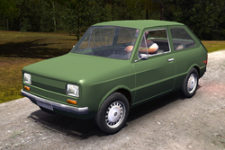 An early version of the Fittan, lacking body panel textures and interior detail, while also featuring a full set of hubcaps.