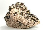 220px-Chalcopyrite-Dolomite-44427