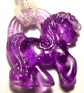 The dark purple Pony Charm.