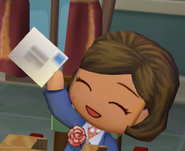 Rosalyn smiling and holding a piece of paper in MySims.