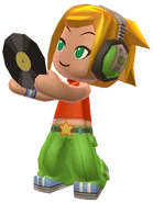 DJ Candy holding a record.