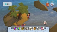 Two treasure chests: one behind the palm tree and one submerged in water.