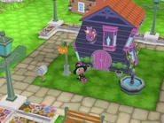 A promotional screenshot of Wendalyn outside of Cauldron Creations.
