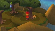 A treasure chest behind a tree.