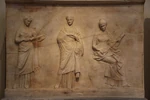 Relief slab, depicting three Muses. About 330-320 B.C.