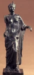 Bronze statuette of Venus (or perhaps her mother Dione), with a dove perched on her head. This figure is a miniature version of a lost Greek original dated to the first century BC.