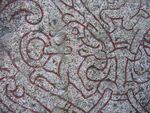 Andvari depicted in part of the Drävle Runestone.