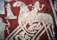 Detail of figure riding an eight-legged horse on the Tjängvide image stone