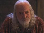 John Shrapnel as Nestor in Troy (2004)