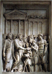 Bas=relief of family group, with an animal, outside large building with columns