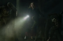 Nancy investigating the corpses