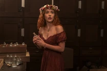 Nancy holding a bottle at the Lovers' Vigil