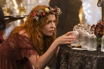 Nancy looks at bottles at the Lovers' Vigil